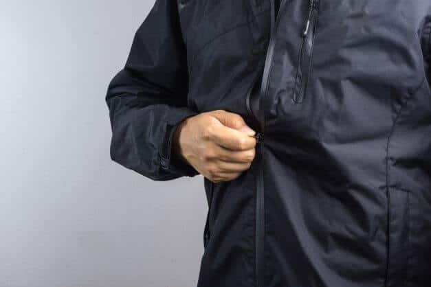 Testing out the zips for the best lightweight waterproof jackets for men