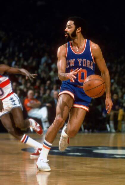 Walt Frazier on court in his custom-made Clydes