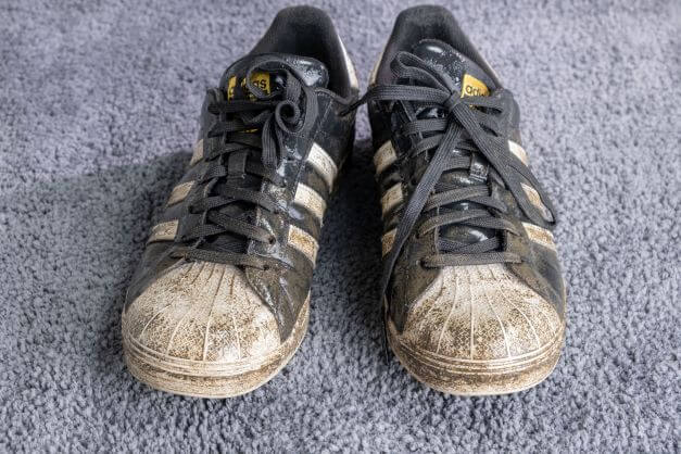 Well worn pair of Adidas Superstars are still iconic