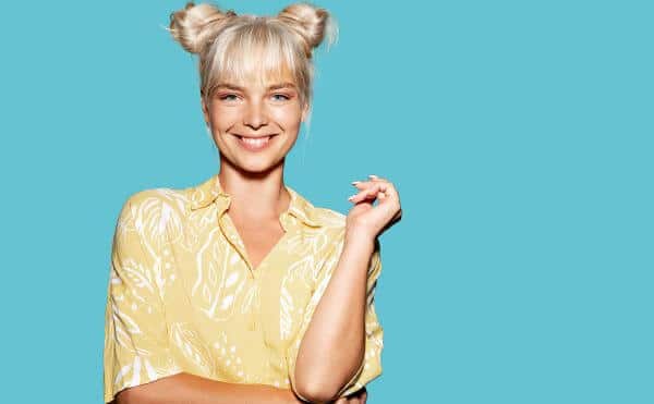 Travel-Friendly Hairstyles: Blonde girl with space buns