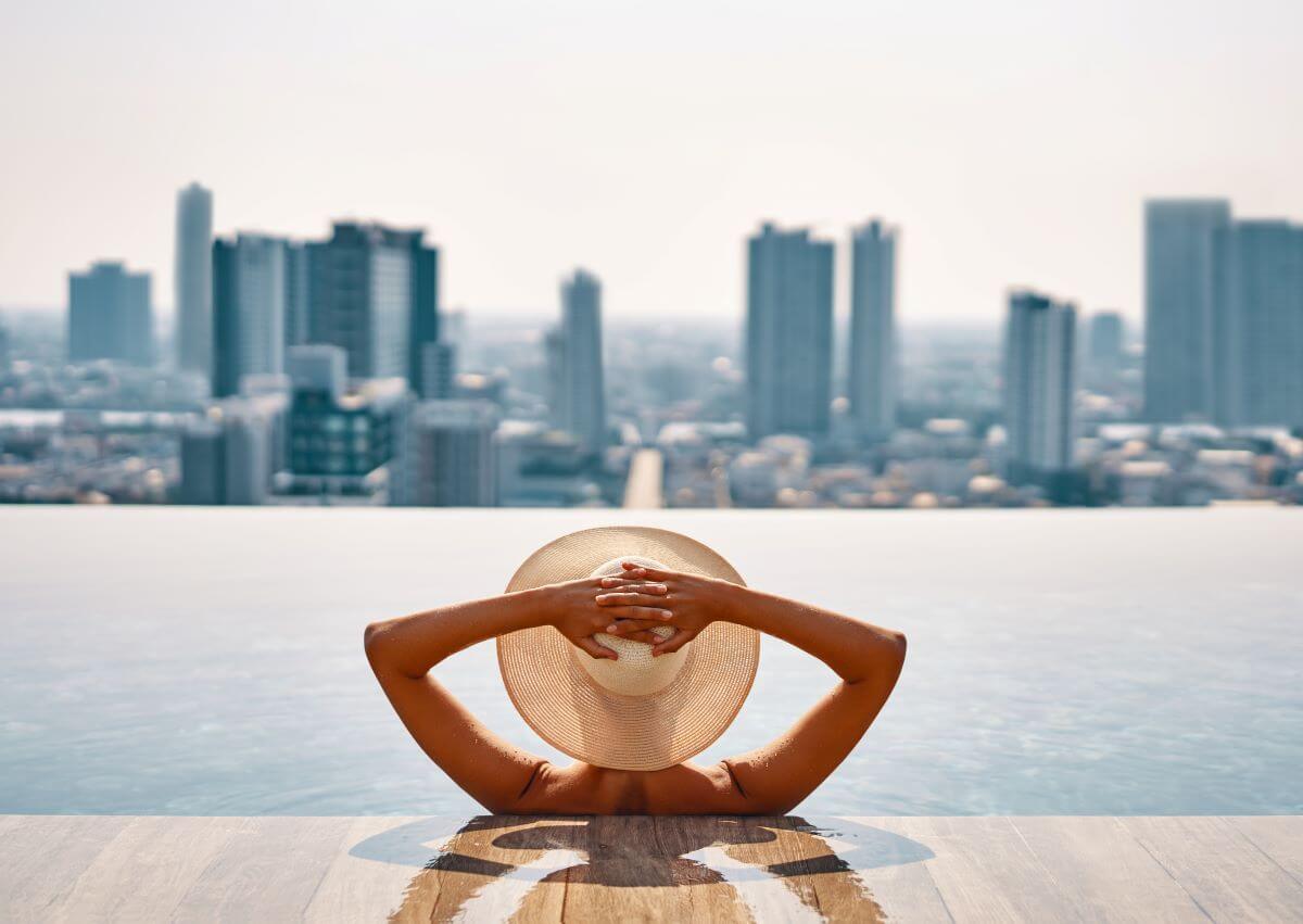 woman relaxing in hotel pool