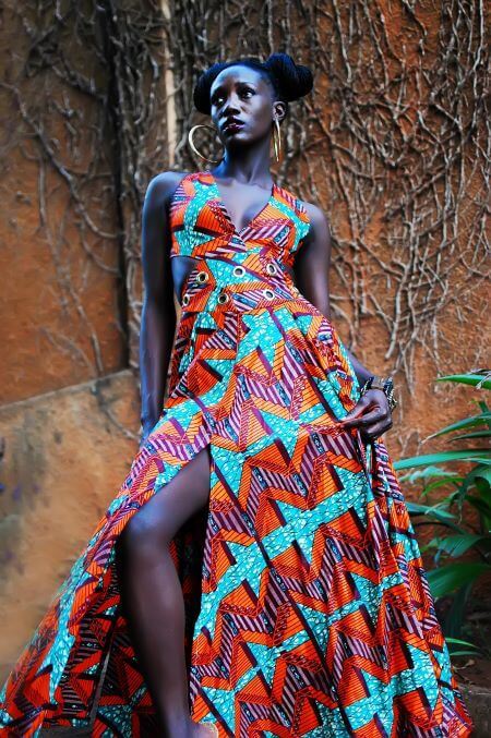 A lady in bright African print dress