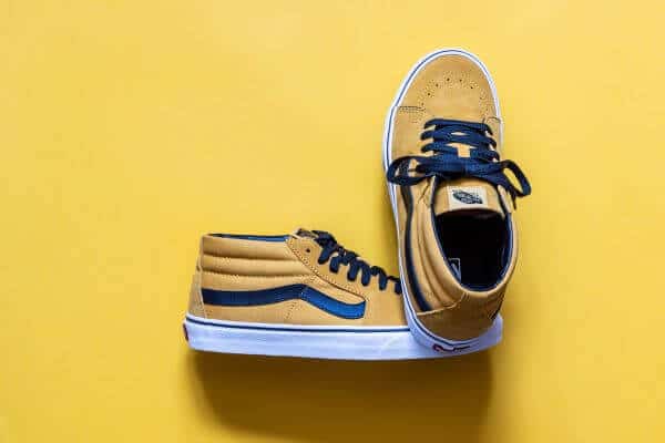 The half cab Vans shoe in yellow with blue stripe