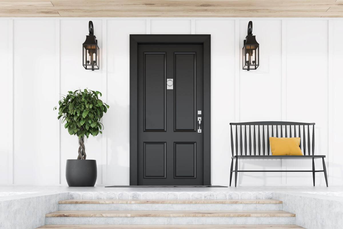 A black front door on a white background