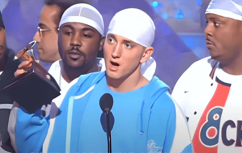 Eminem wears a durag as he collects a Grammy for his album The Eminem Show with D12